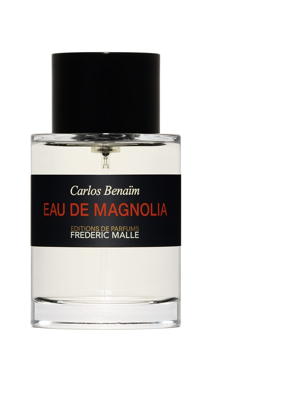 A clear perfume bottle labeled "Eau de Magnolia" by Carlos Benaim, featuring a black cap and a minimalist design. The bottle is set against a plain background.