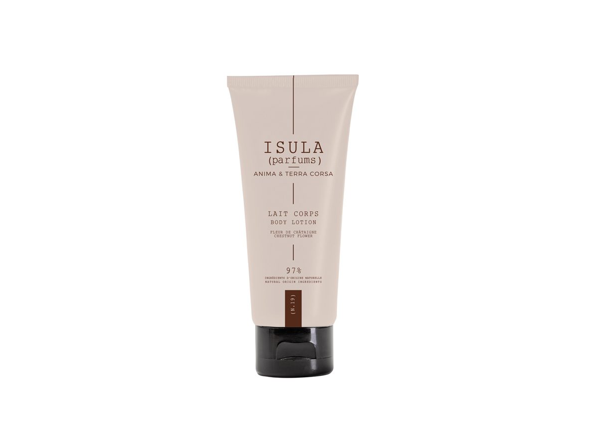 A tube of Isula (parfums) Lait Corps body lotion, featuring a minimalist design in neutral tones with black accents. The product is labeled with the brand name and description prominently displayed.