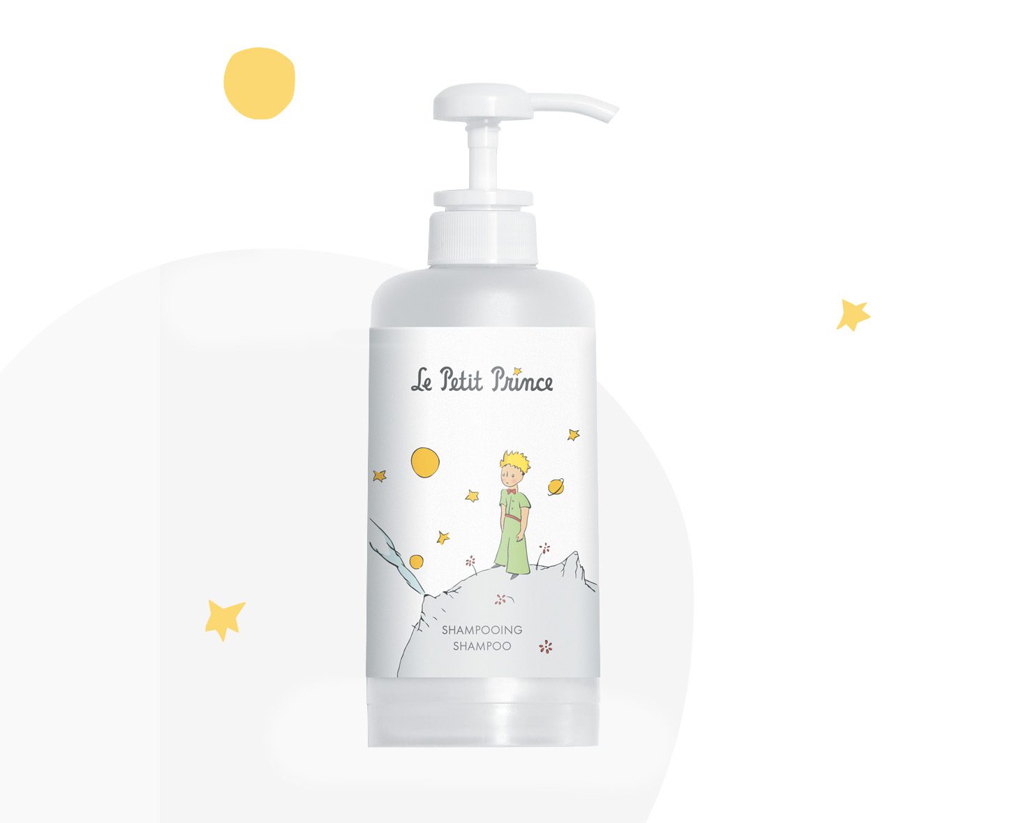 A clear bottle of shampoo featuring an illustration of a small prince amidst stars and planets, with the text "Le Petit Prince" and "Shampooing" on the label.