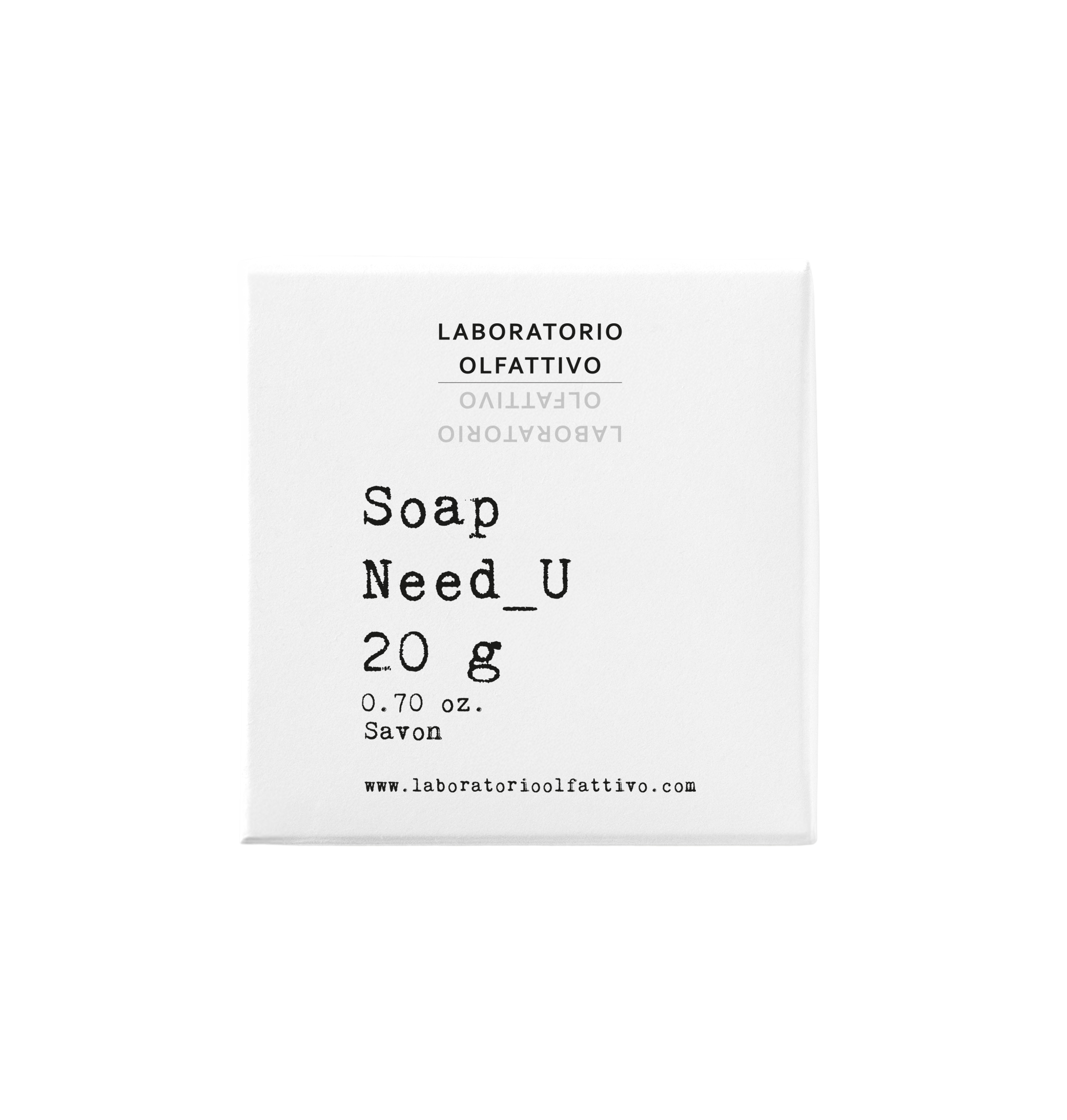 Laboratorio Olfattivo Need_U soap in minimalist white packaging on a clean light-grey background.