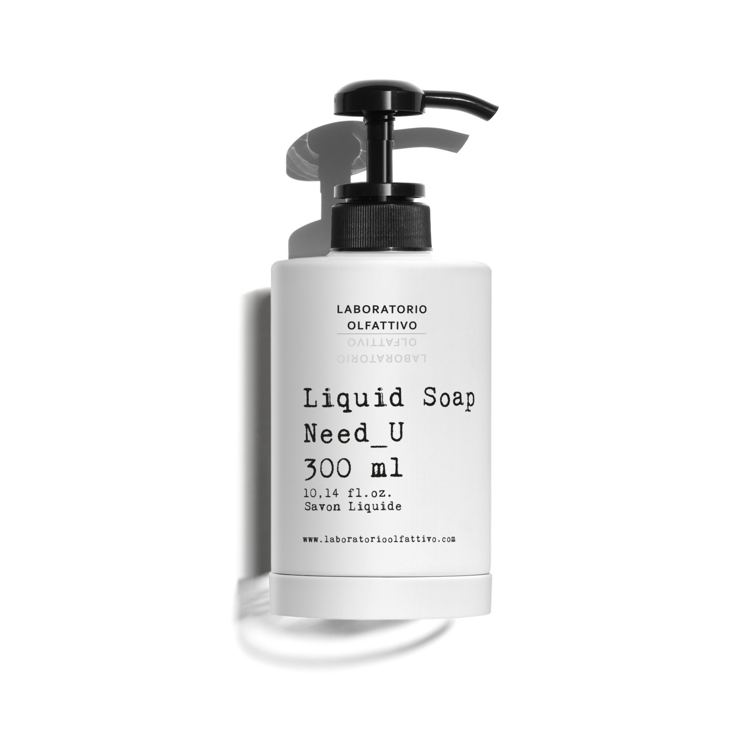 Laboratorio Olfattivo Need_U liquid soap in a white pump bottle with minimalist packaging on a clean light-grey background.