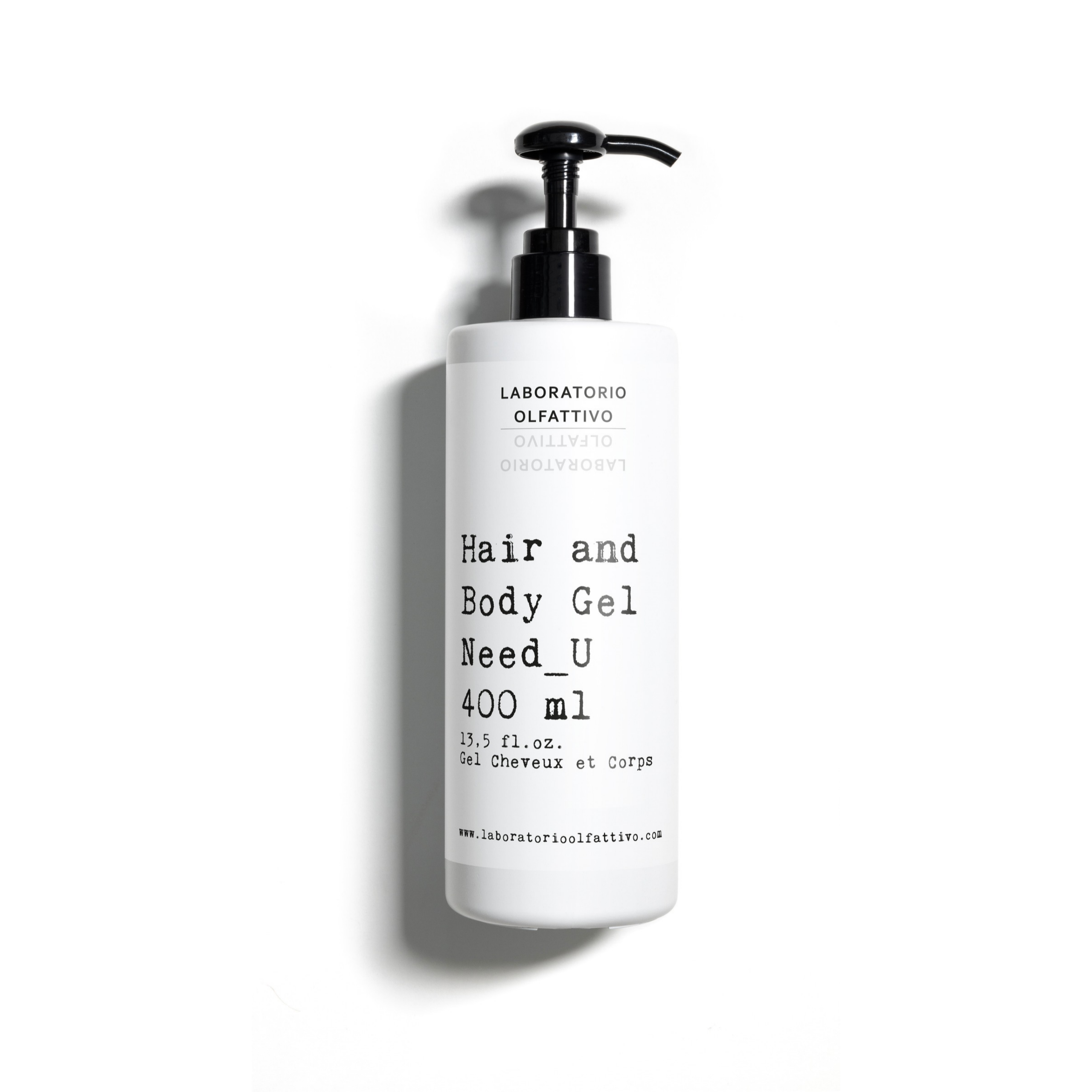 Laboratorio Olfattivo Need_U hair and body gel in a white pump bottle with minimalist packaging on a clean light-grey background.