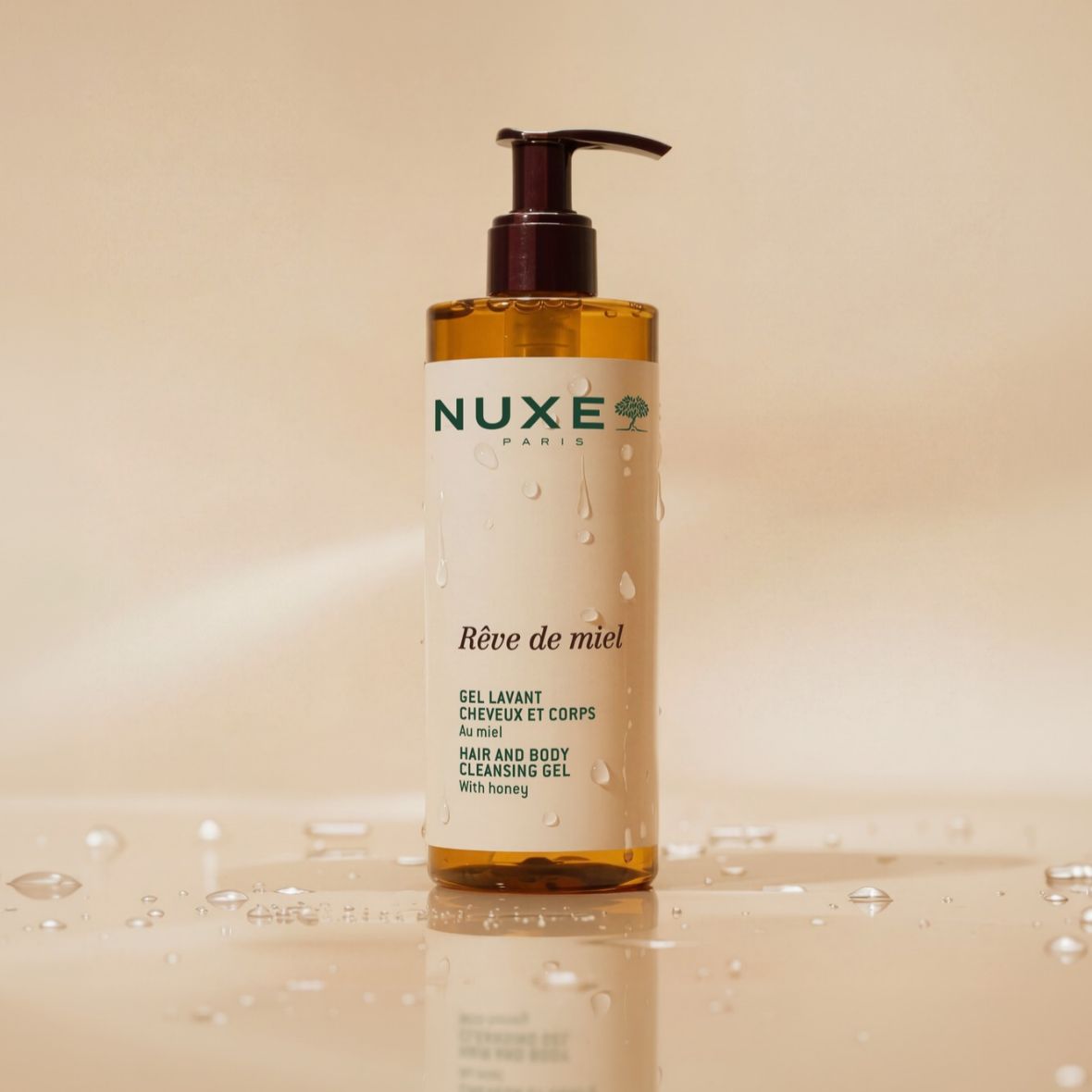 NUXE Rêve de Miel Hair and Body Cleansing Gel with honey in pump bottle.